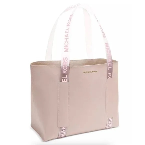 Michael Kors Handbags - Michael Kors Blush Pink Vegan Leather Tote with Logo Printed Transparent Handles